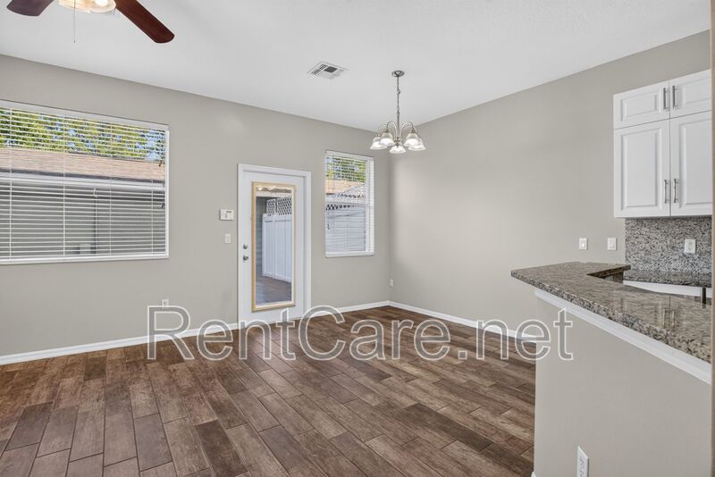 Stunning 3/2.5 corner townhome in Lake Reams with 2 car garage! Available Now! property image