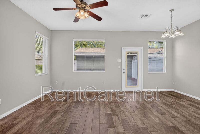 Stunning 3/2.5 corner townhome in Lake Reams with 2 car garage! Available Now! property image