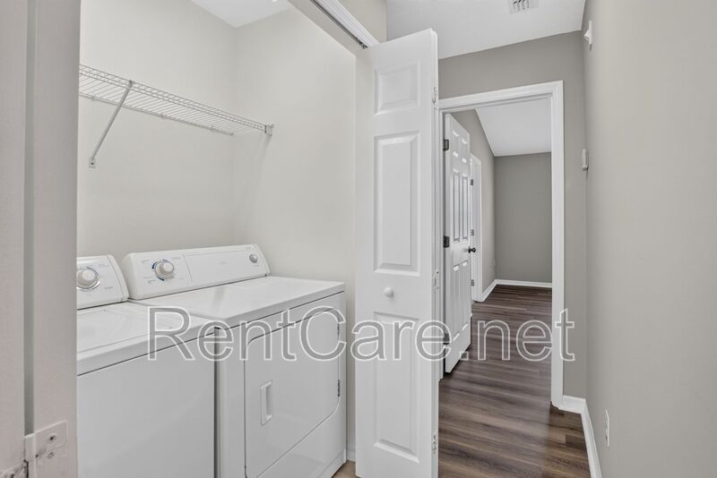 Stunning 3/2.5 corner townhome in Lake Reams with 2 car garage! Available Now! property image