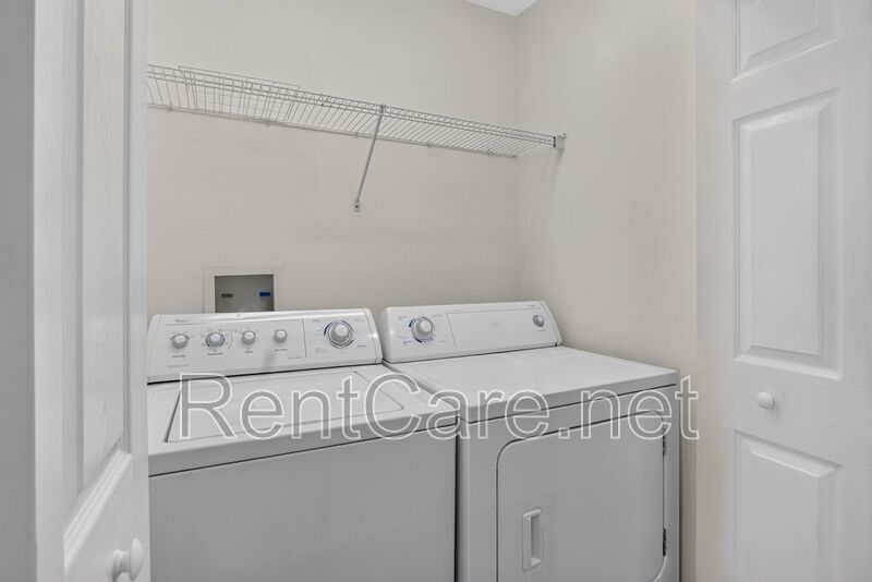 Stunning 3/2.5 corner townhome in Lake Reams with 2 car garage! Available Now! property image
