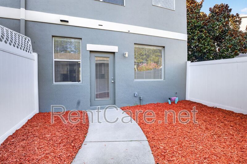 Stunning 3/2.5 corner townhome in Lake Reams with 2 car garage! Available Now! property image