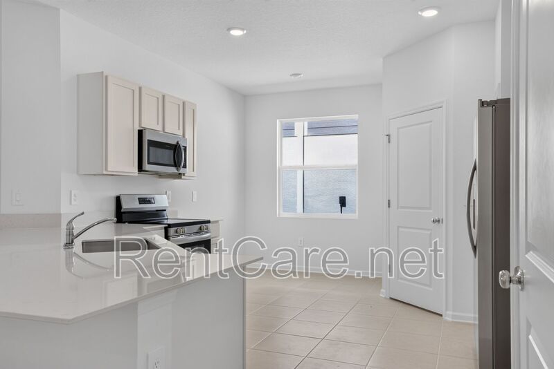 Stunning new construction 3/2 in Wynnstone Gated Community of Davenport.  Available now! property image