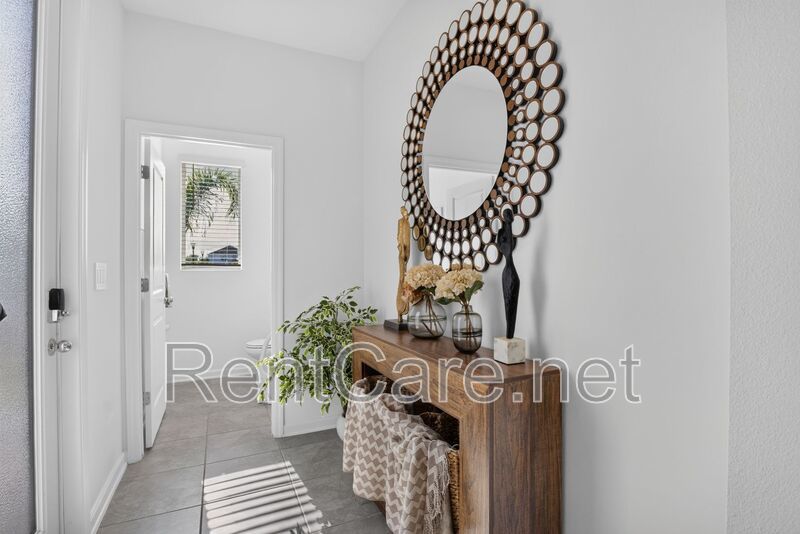 Stunning modern town home in Champions Gate with fence enclosed yard! property image