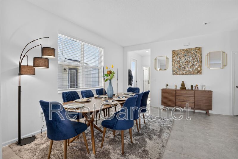 Stunning modern town home in Champions Gate with fence enclosed yard! property image