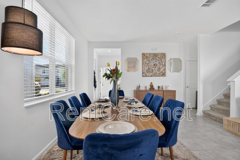 Stunning modern town home in Champions Gate with fence enclosed yard! property image