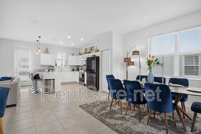 Stunning modern town home in Champions Gate with fence enclosed yard! property image