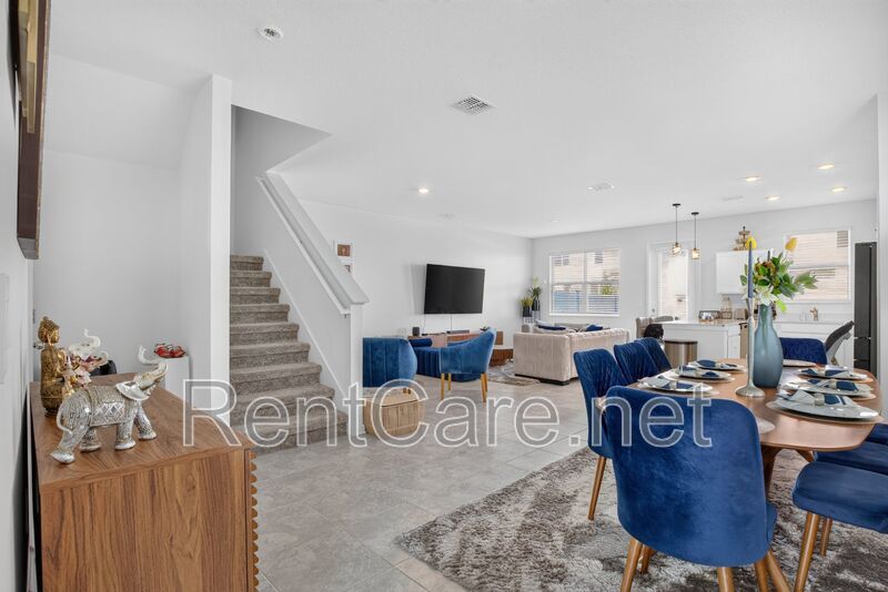 Stunning modern town home in Champions Gate with fence enclosed yard! property image
