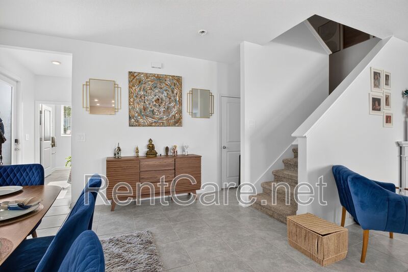 Stunning modern town home in Champions Gate with fence enclosed yard! property image