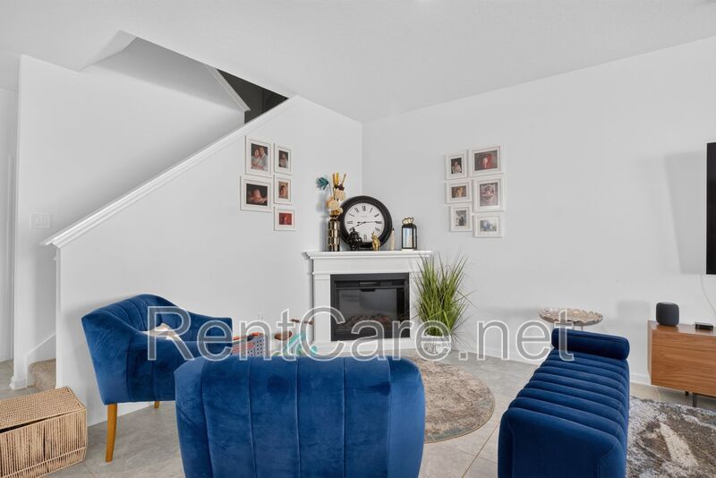 Stunning modern town home in Champions Gate with fence enclosed yard! property image