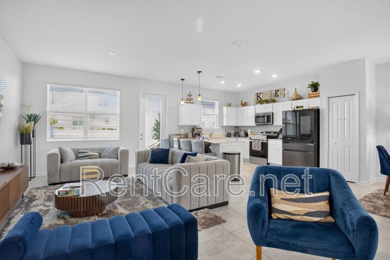 Stunning modern town home in Champions Gate with fence enclosed yard! property image