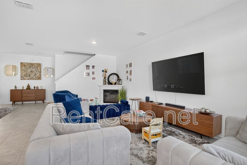 Stunning modern town home in Champions Gate with fence enclosed yard! property image