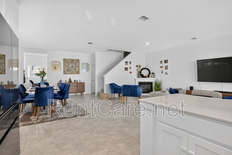Stunning modern town home in Champions Gate with fence enclosed yard! property image