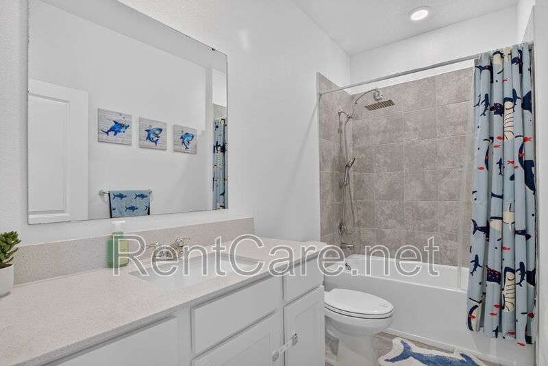 Stunning modern town home in Champions Gate with fence enclosed yard! property image