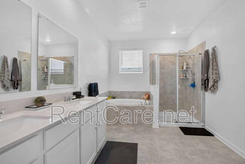 Stunning modern town home in Champions Gate with fence enclosed yard! property image