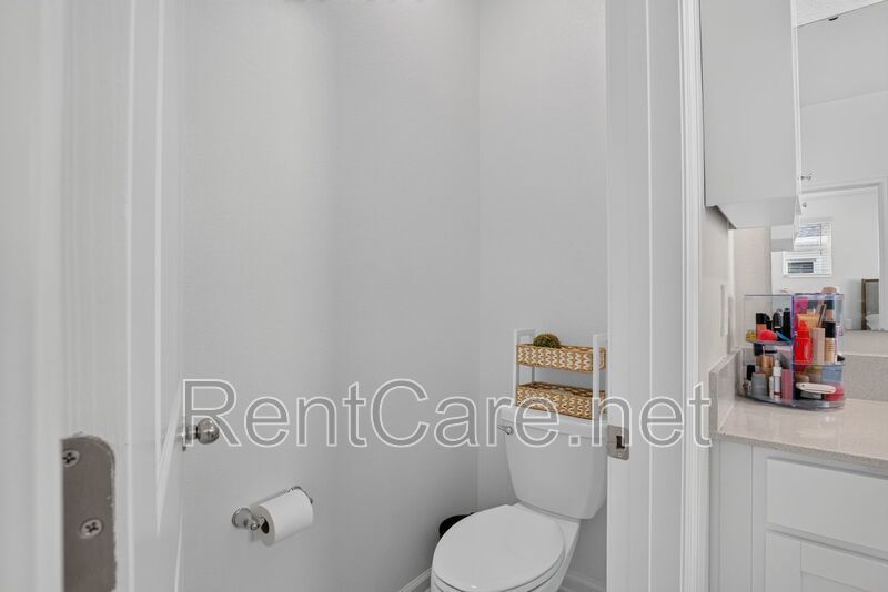 Stunning modern town home in Champions Gate with fence enclosed yard! property image