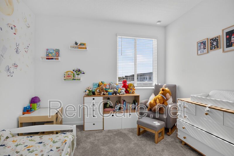 Stunning modern town home in Champions Gate with fence enclosed yard! property image
