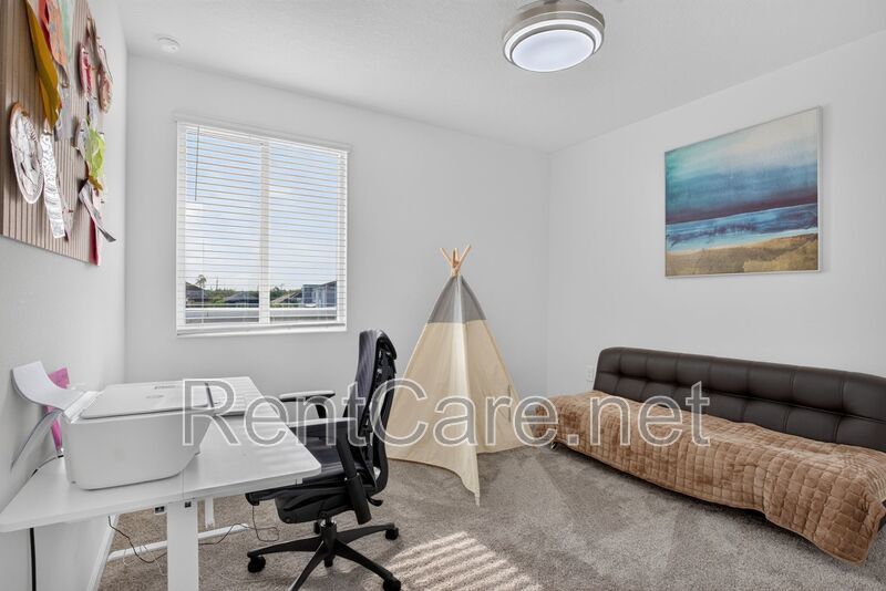 Stunning modern town home in Champions Gate with fence enclosed yard! property image