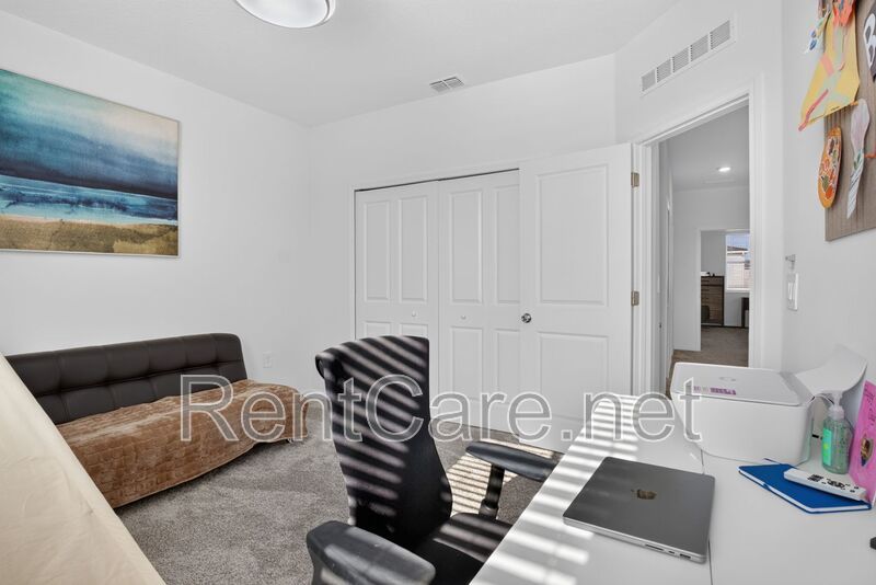 Stunning modern town home in Champions Gate with fence enclosed yard! property image