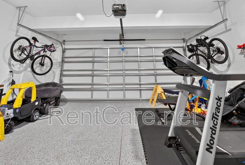 Stunning modern town home in Champions Gate with fence enclosed yard! property image