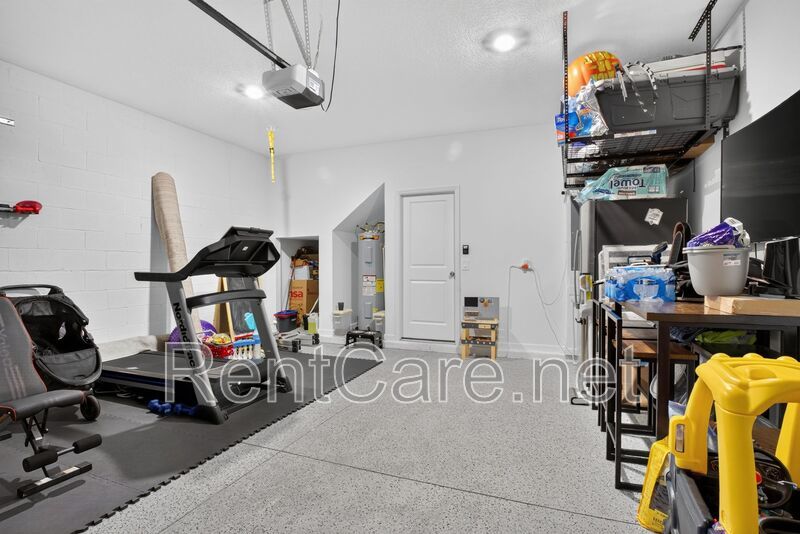 Stunning modern town home in Champions Gate with fence enclosed yard! property image