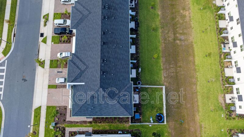 Stunning modern town home in Champions Gate with fence enclosed yard! property image