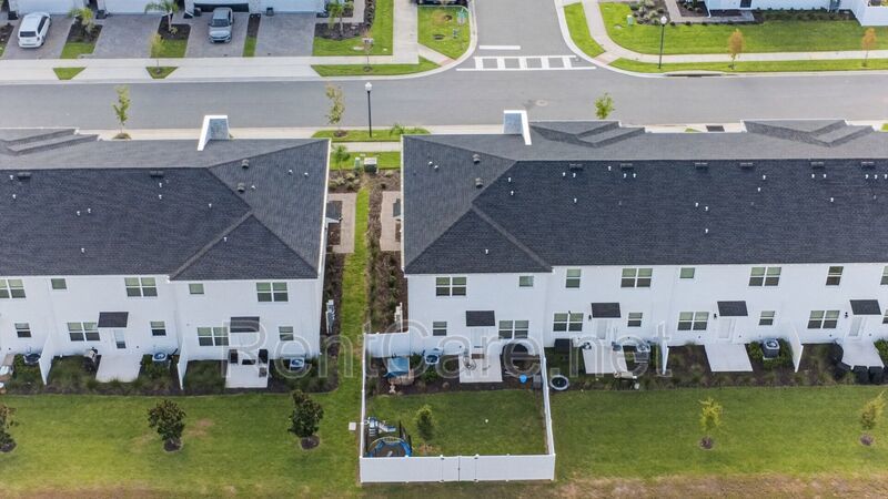 Stunning modern town home in Champions Gate with fence enclosed yard! property image