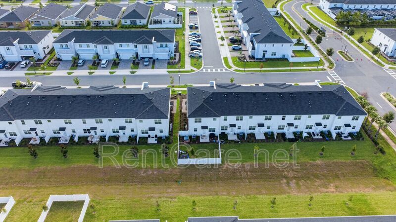 Stunning modern town home in Champions Gate with fence enclosed yard! property image