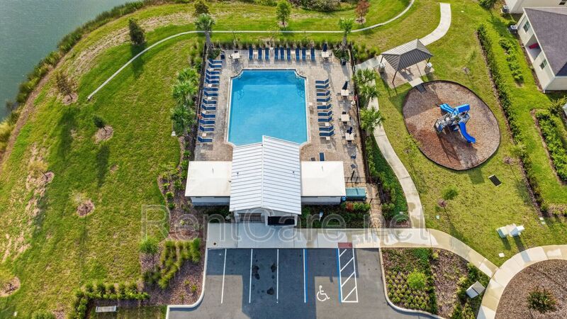 Stunning modern town home in Champions Gate with fence enclosed yard! property image