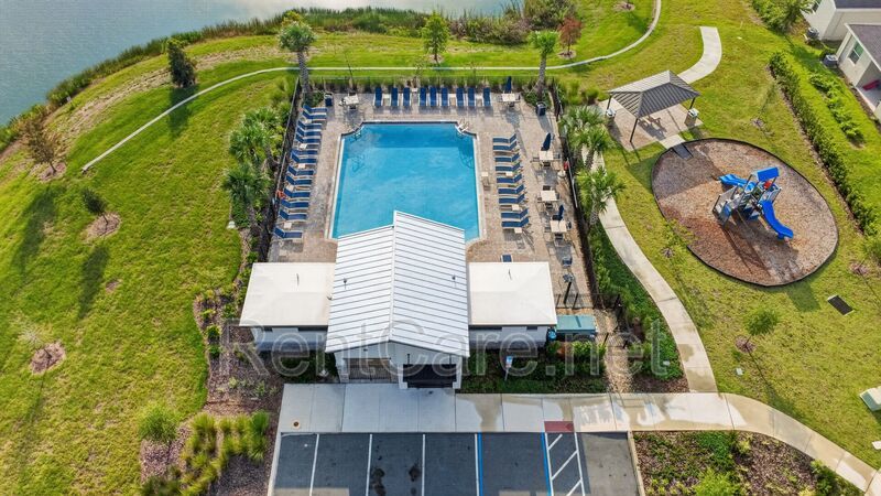 Stunning modern town home in Champions Gate with fence enclosed yard! property image