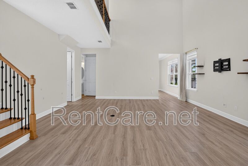 Stunning 4/3.5 home with an office and fence enclosed yard! Located at the Enclave at Hamlin and available for immediate occupancy! property image