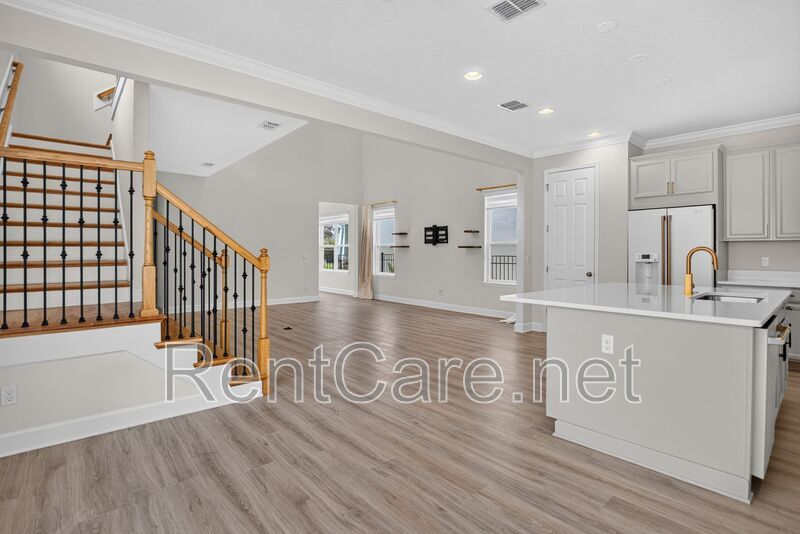 Stunning 4/3.5 home with an office and fence enclosed yard! Located at the Enclave at Hamlin and available for immediate occupancy! property image