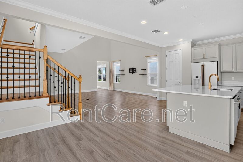 Stunning 4/3.5 home with an office and fence enclosed yard! Located at the Enclave at Hamlin and available for immediate occupancy! property image