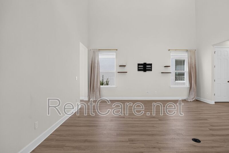Stunning 4/3.5 home with an office and fence enclosed yard! Located at the Enclave at Hamlin and available for immediate occupancy! property image