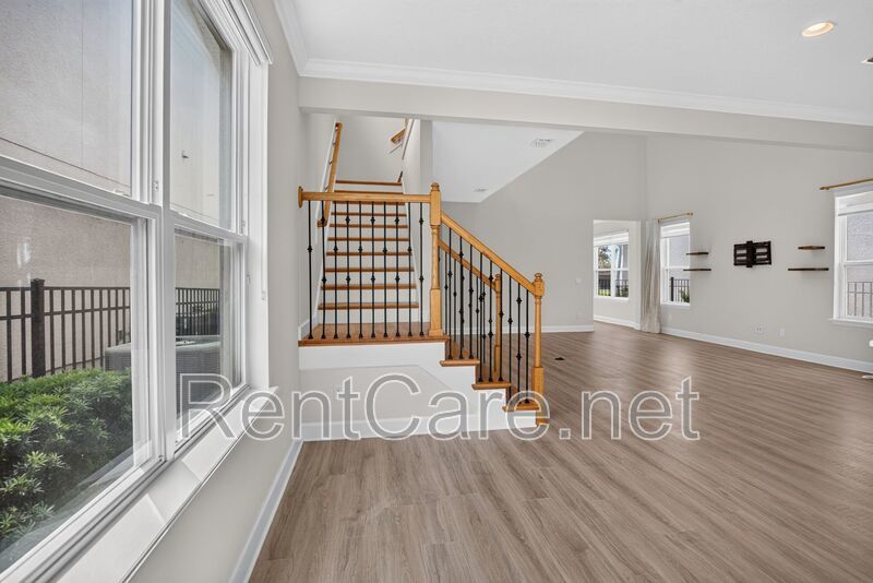 Stunning 4/3.5 home with an office and fence enclosed yard! Located at the Enclave at Hamlin and available for immediate occupancy! property image