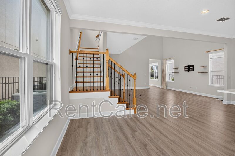 Stunning 4/3.5 home with an office and fence enclosed yard! Located at the Enclave at Hamlin and available for immediate occupancy! property image
