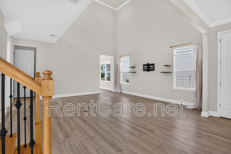 Stunning 4/3.5 home with an office and fence enclosed yard! Located at the Enclave at Hamlin and available for immediate occupancy! property image