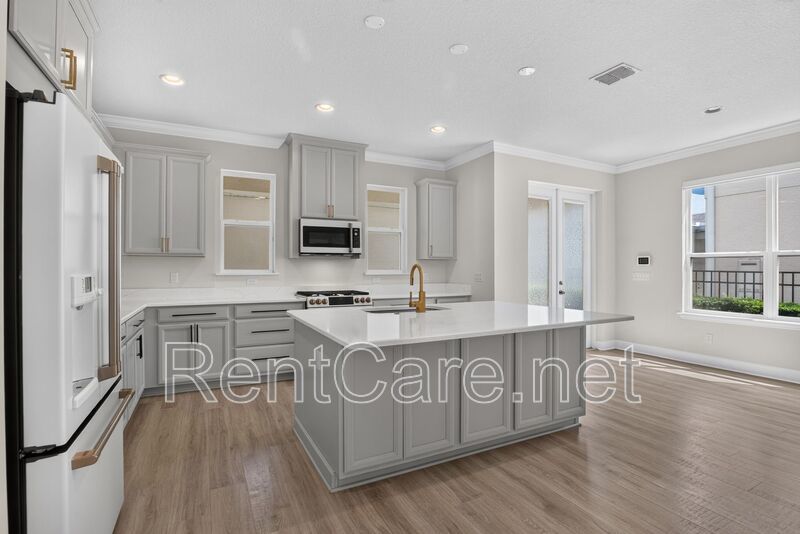 Stunning 4/3.5 home with an office and fence enclosed yard! Located at the Enclave at Hamlin and available for immediate occupancy! property image
