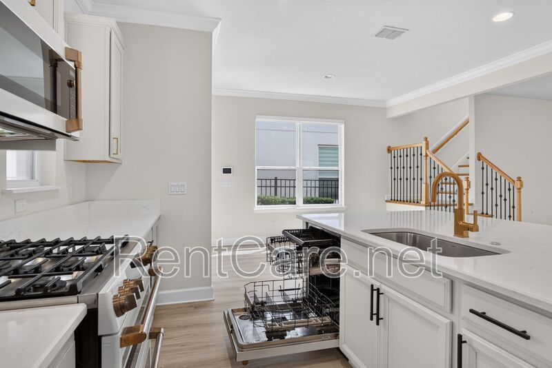 Stunning 4/3.5 home with an office and fence enclosed yard! Located at the Enclave at Hamlin and available for immediate occupancy! property image