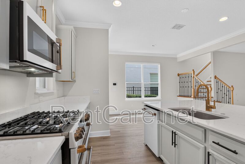 Stunning 4/3.5 home with an office and fence enclosed yard! Located at the Enclave at Hamlin and available for immediate occupancy! property image