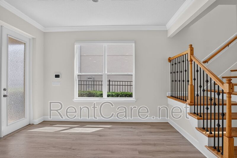 Stunning 4/3.5 home with an office and fence enclosed yard! Located at the Enclave at Hamlin and available for immediate occupancy! property image