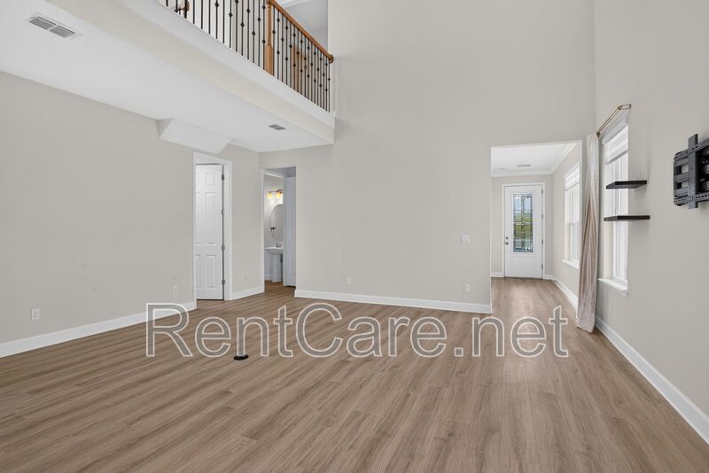 Stunning 4/3.5 home with an office and fence enclosed yard! Located at the Enclave at Hamlin and available for immediate occupancy! property image