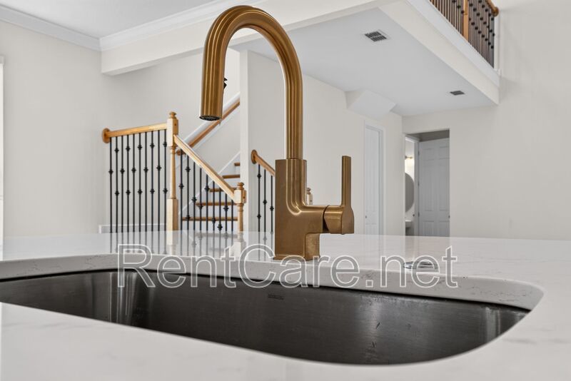 Stunning 4/3.5 home with an office and fence enclosed yard! Located at the Enclave at Hamlin and available for immediate occupancy! property image
