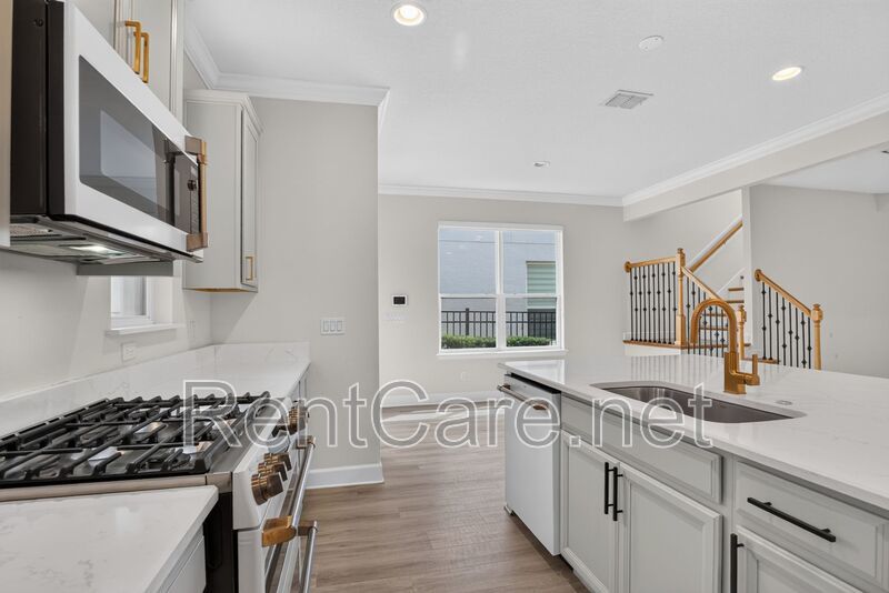 Stunning 4/3.5 home with an office and fence enclosed yard! Located at the Enclave at Hamlin and available for immediate occupancy! property image