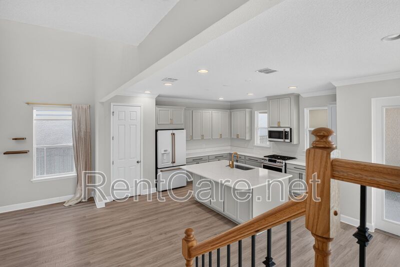 Stunning 4/3.5 home with an office and fence enclosed yard! Located at the Enclave at Hamlin and available for immediate occupancy! property image