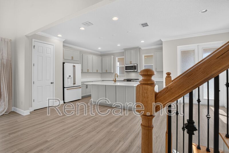 Stunning 4/3.5 home with an office and fence enclosed yard! Located at the Enclave at Hamlin and available for immediate occupancy! property image