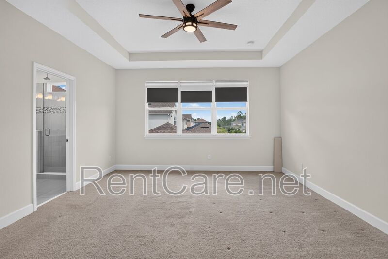 Stunning 4/3.5 home with an office and fence enclosed yard! Located at the Enclave at Hamlin and available for immediate occupancy! property image