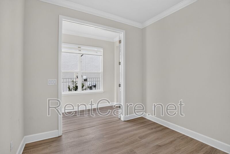 Stunning 4/3.5 home with an office and fence enclosed yard! Located at the Enclave at Hamlin and available for immediate occupancy! property image