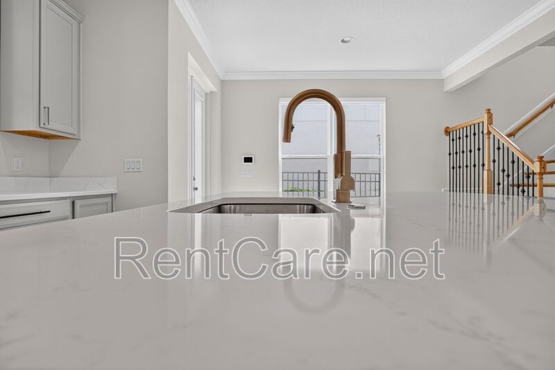 Stunning 4/3.5 home with an office and fence enclosed yard! Located at the Enclave at Hamlin and available for immediate occupancy! property image