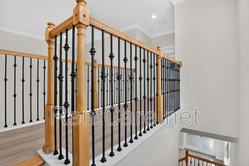 Stunning 4/3.5 home with an office and fence enclosed yard! Located at the Enclave at Hamlin and available for immediate occupancy! property image