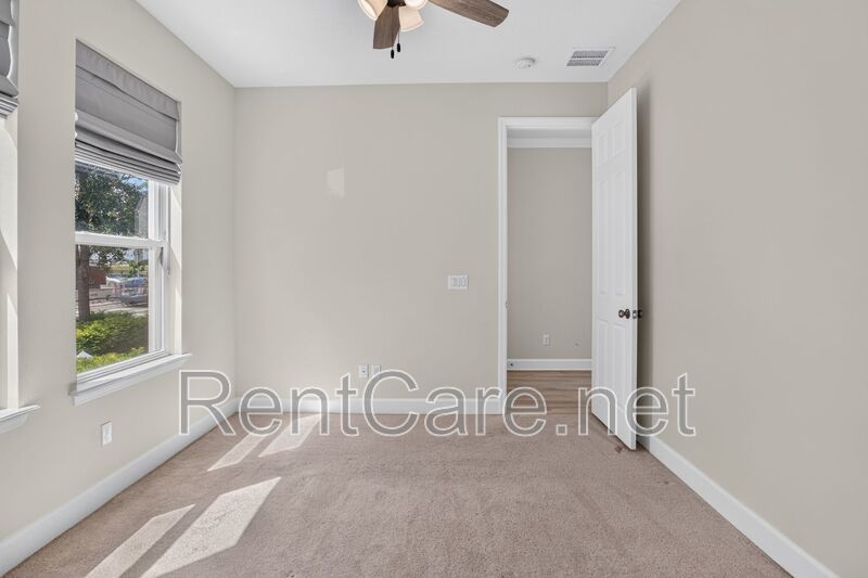 Stunning 4/3.5 home with an office and fence enclosed yard! Located at the Enclave at Hamlin and available for immediate occupancy! property image